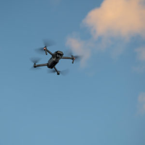Drone in flight taking pictures Drone in flight taking pictures
